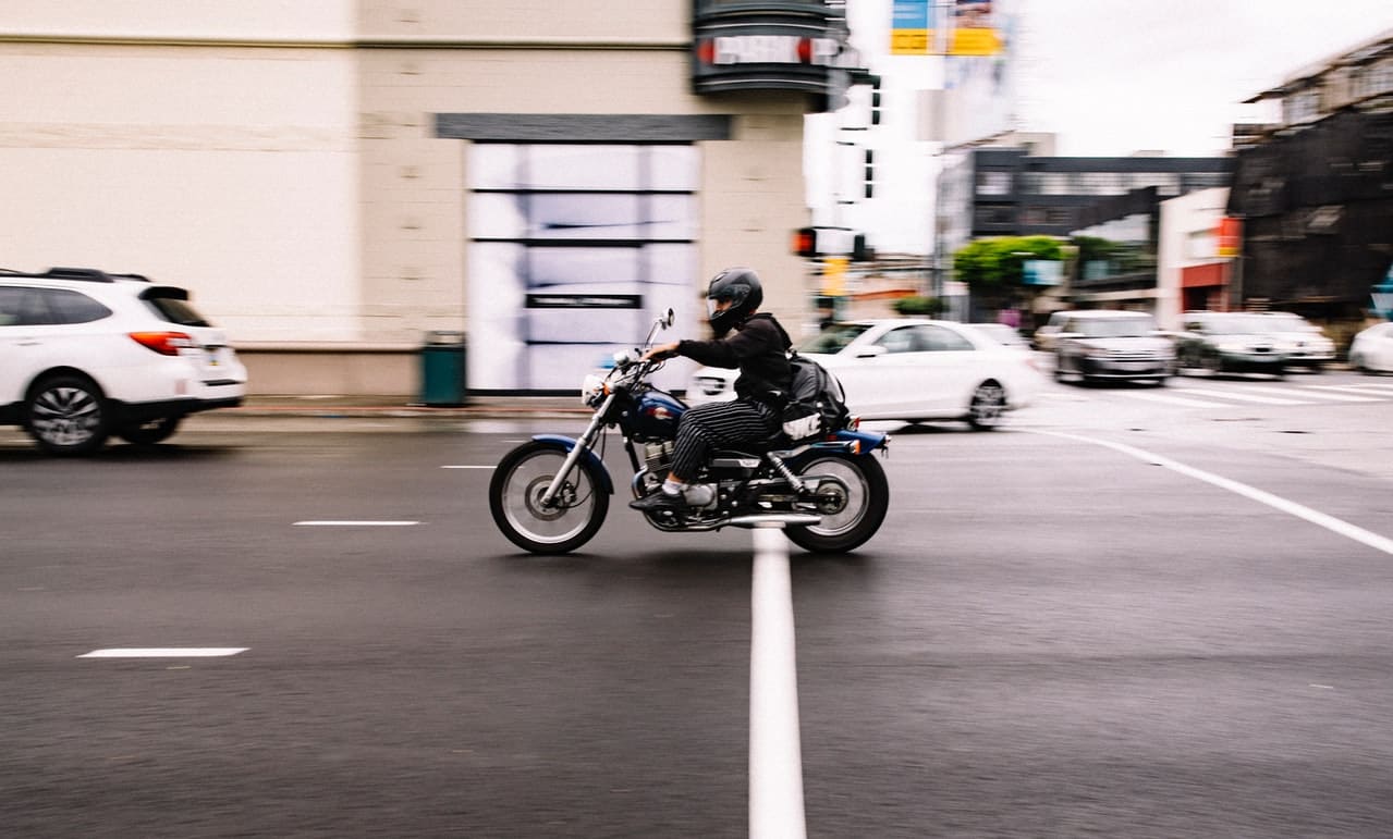 motorcyclist on busy street