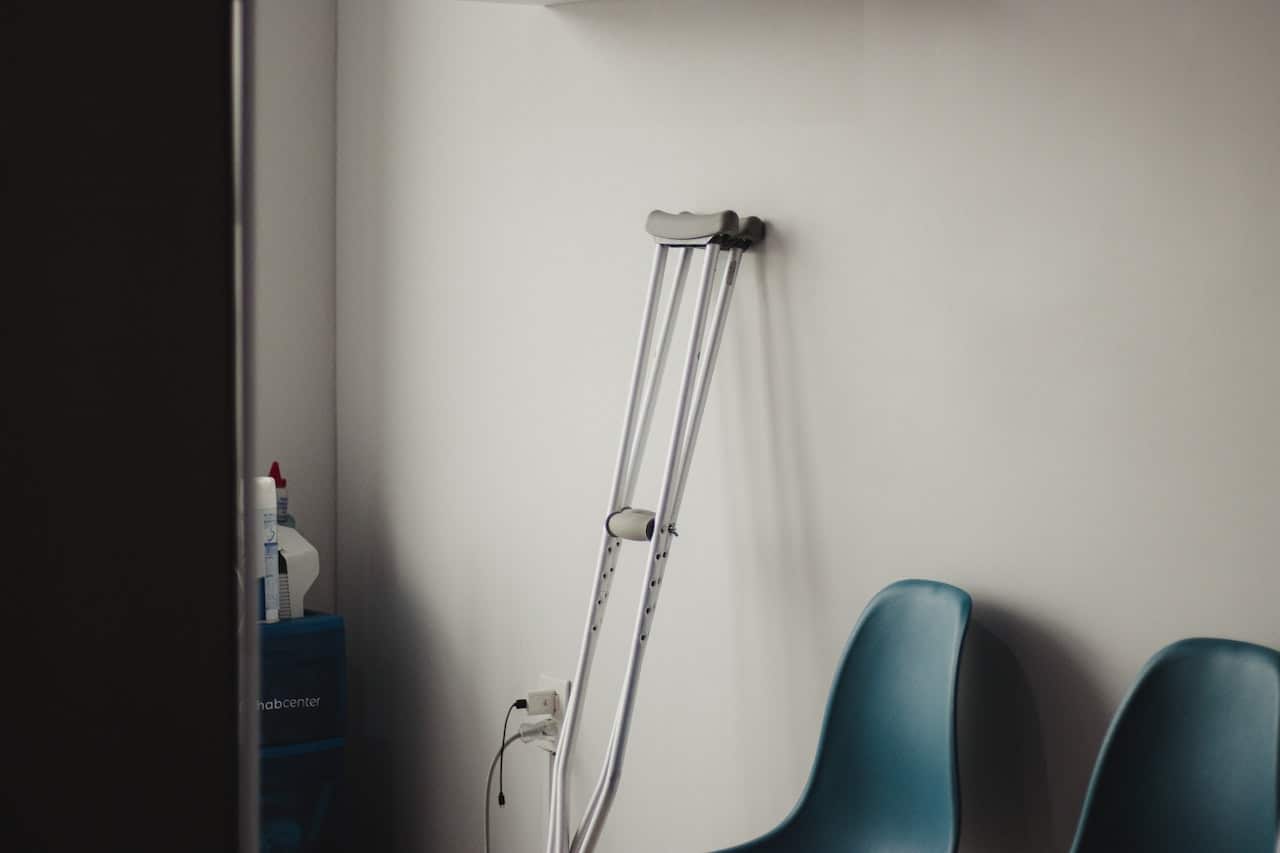 a crutch leaning against wall in doctor office