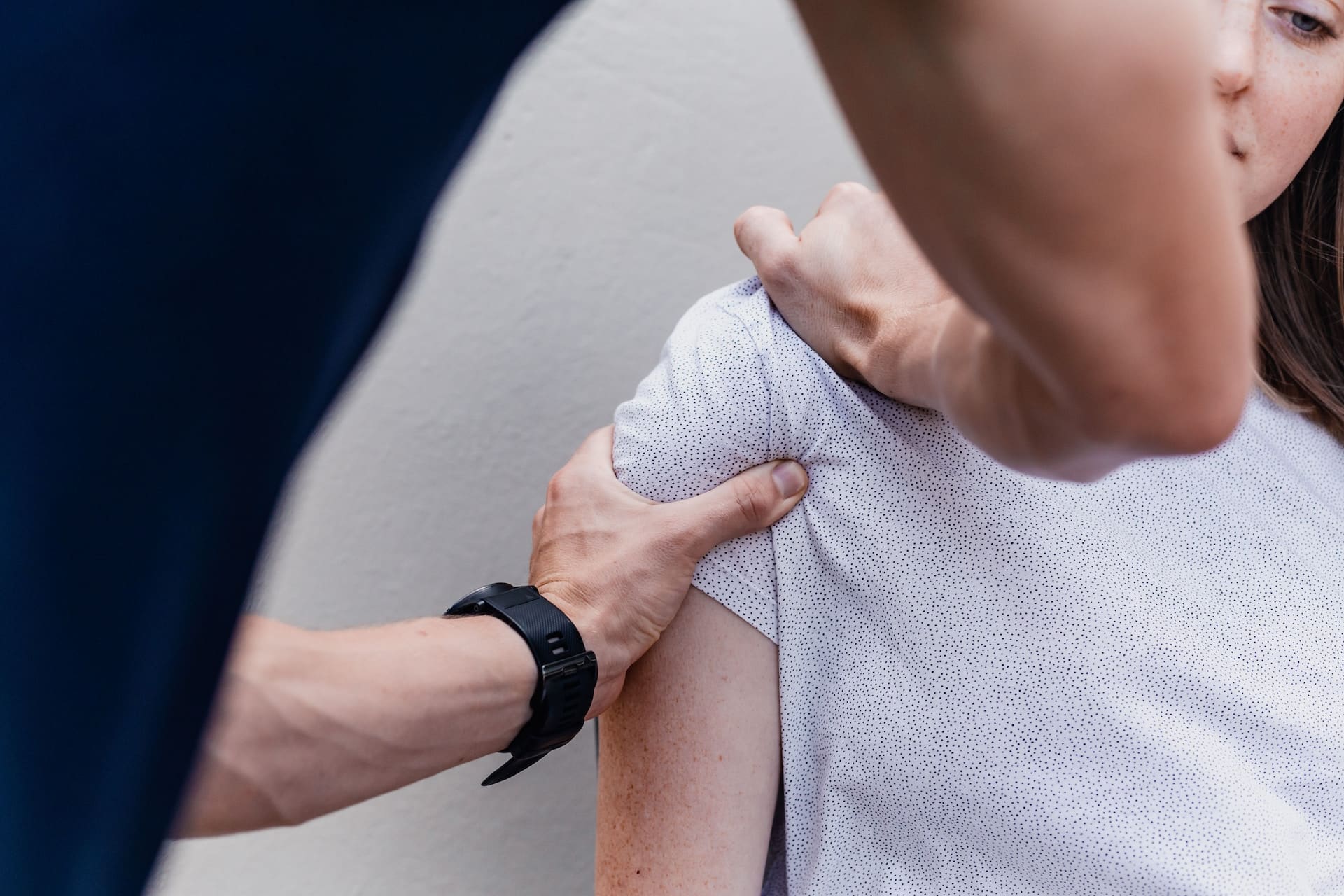 a woman receiving physical therapy treatment