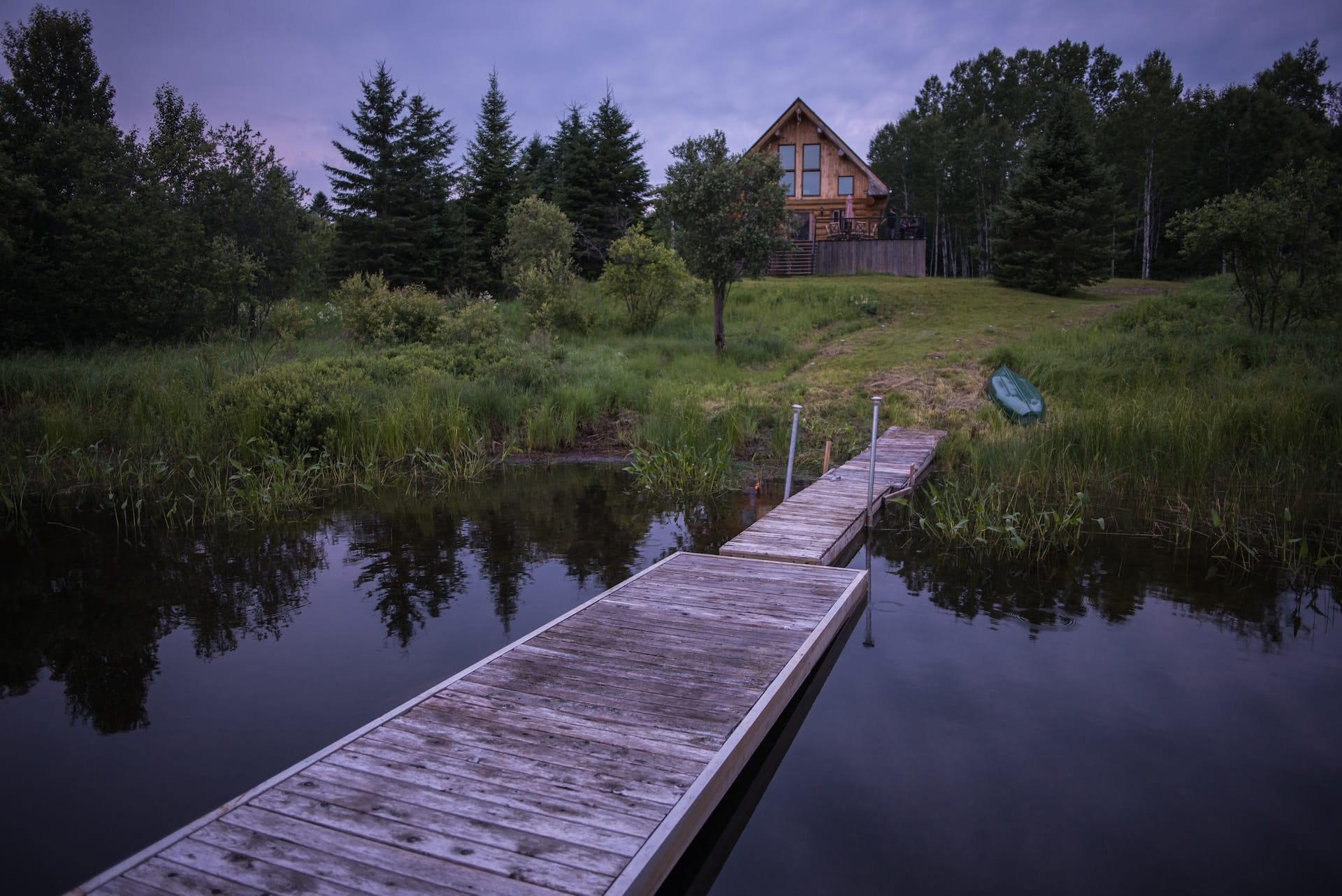 gray dock and cabin