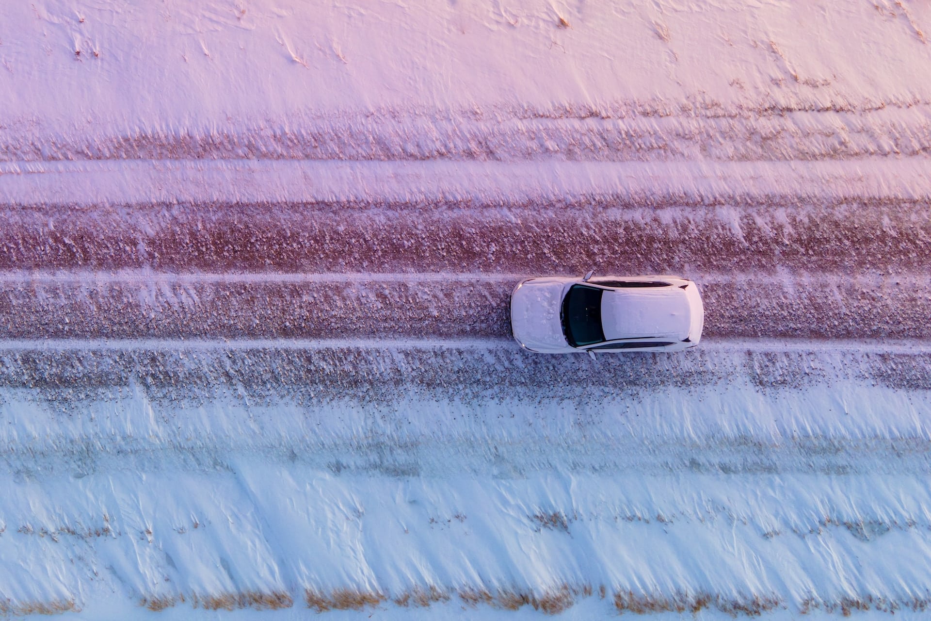 white car on road during winter