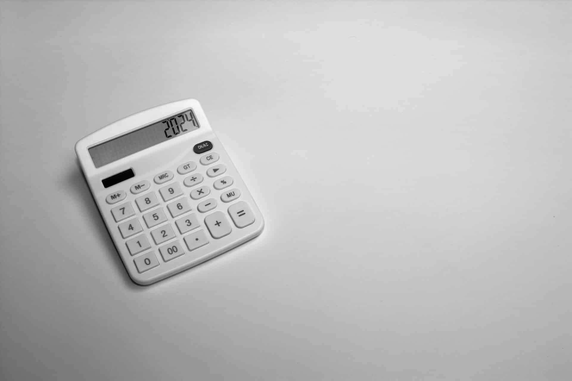 white calculator on white table