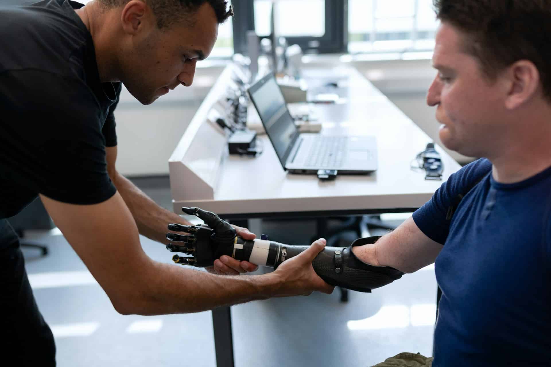 man being fitted for prosthetics