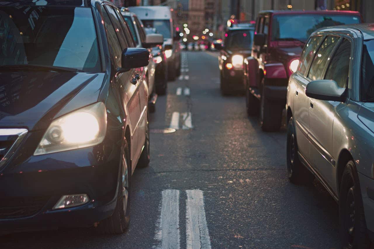 two rows of cars at dusk