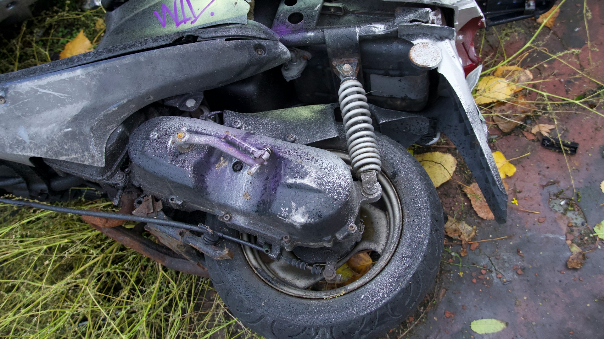 a motorycle laying on the ground