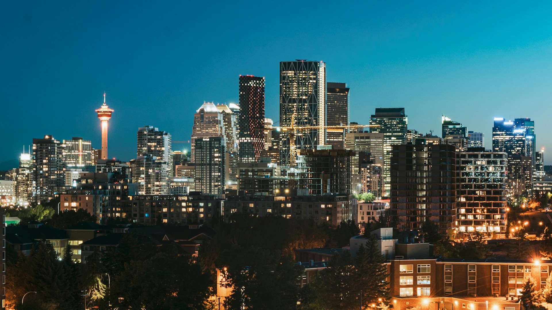 Calgary skyline lit up against a dusk sky, representing Best Lawyers Canada.